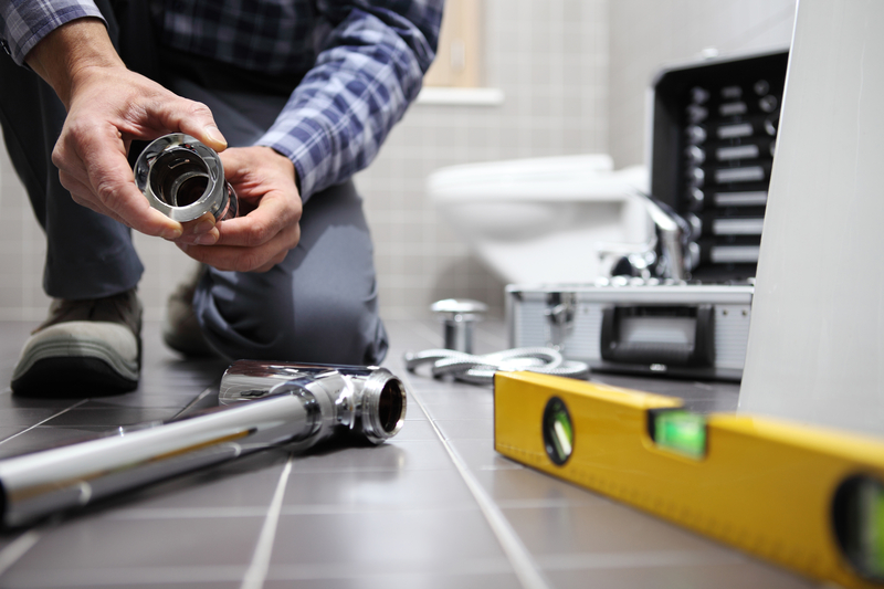 Plumber working. templated Home Services websites. These are high quality websites for Electricians Plumbers and Floorers